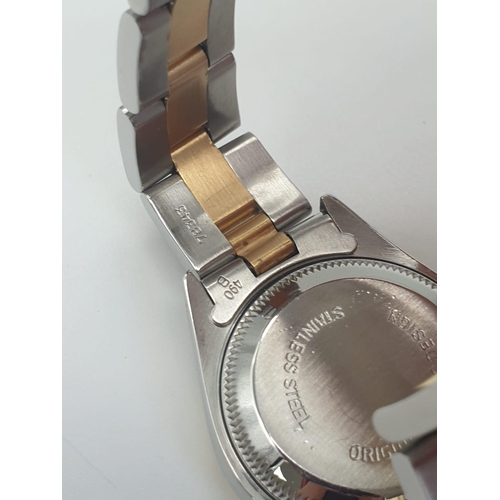 158 - A Rolex Oyster Perpetual Datejust Ladies Watch. Bi-metal strap and case - 26mm. Silver-tone dial. Au... 