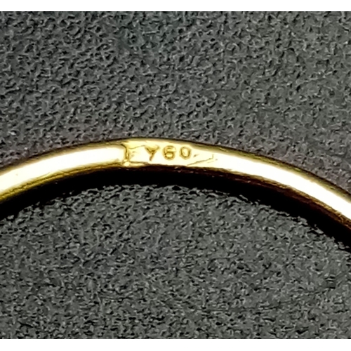 735 - An 18K Yellow Gold Diamond Solitaire Ring. 0.10ct. Size M.
0.85g total weight.