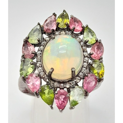 629 - A Fire Opal Gemstone Ring with Pink/Green Tourmaline and Diamond Halos. Diamond - 0.30ct. Set in 925... 