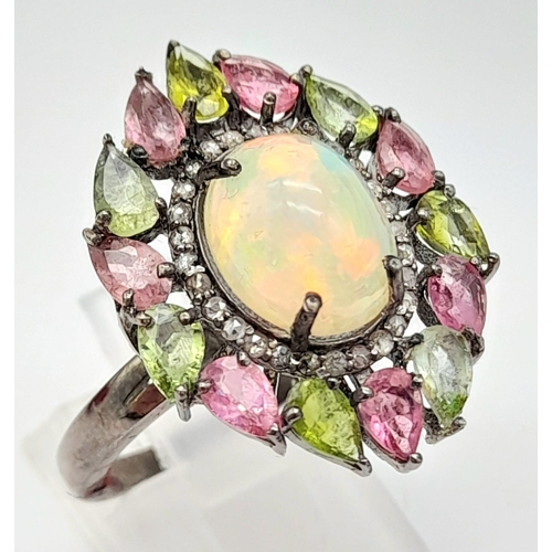 629 - A Fire Opal Gemstone Ring with Pink/Green Tourmaline and Diamond Halos. Diamond - 0.30ct. Set in 925... 