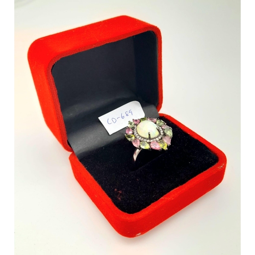 629 - A Fire Opal Gemstone Ring with Pink/Green Tourmaline and Diamond Halos. Diamond - 0.30ct. Set in 925... 