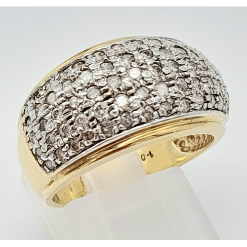 66 - A 9K Yellow Gold Diamond Encrusted Sloped Band Ring. Size P. Over 70 small diamonds. Size O 1/2. 6.3... 