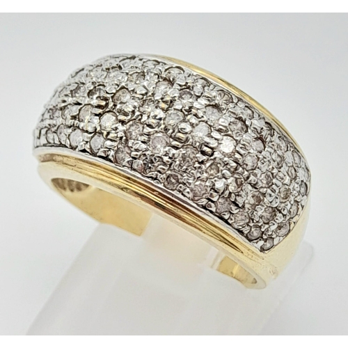 66 - A 9K Yellow Gold Diamond Encrusted Sloped Band Ring. Size P. Over 70 small diamonds. Size O 1/2. 6.3... 