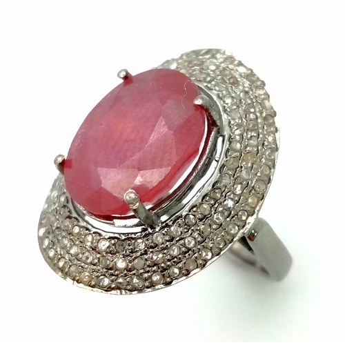 412 - A 9.50ct Ruby Gemstone Ring with 0.90ct of Diamond Accents. Set in 925 Silver. Size M. Comes with a ... 