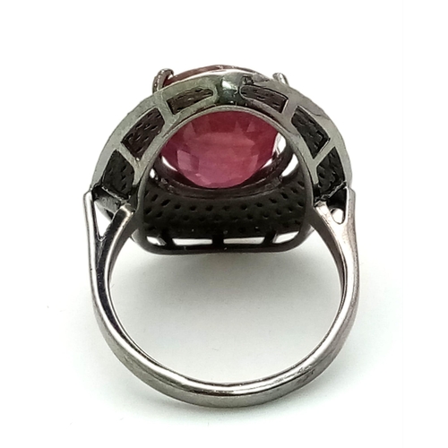 412 - A 9.50ct Ruby Gemstone Ring with 0.90ct of Diamond Accents. Set in 925 Silver. Size M. Comes with a ... 