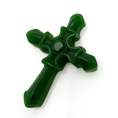 437 - A Green Jade Cross Pendant.  5cm x 4cm.