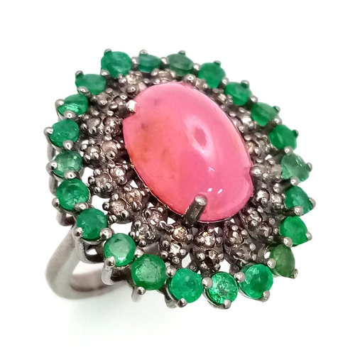 440 - A 6.70ct Ruby Cabochon Ring with 1.80ct Emerald and 0.60ct Diamond Accents. Set in 925 Silver. Size ... 