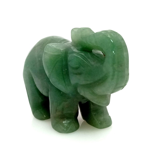 630 - A Hand-Carved Green Jade Elephant Figurine. 5cm x 4cm