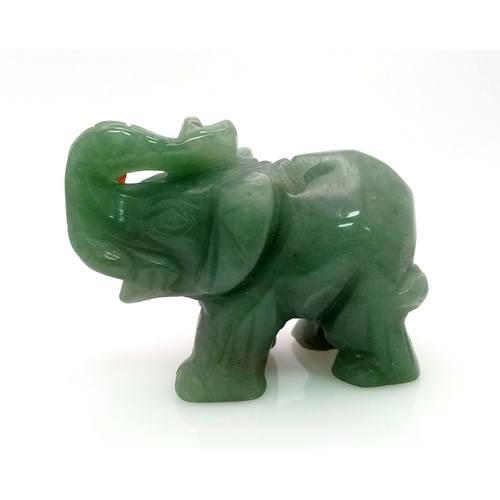 630 - A Hand-Carved Green Jade Elephant Figurine. 5cm x 4cm