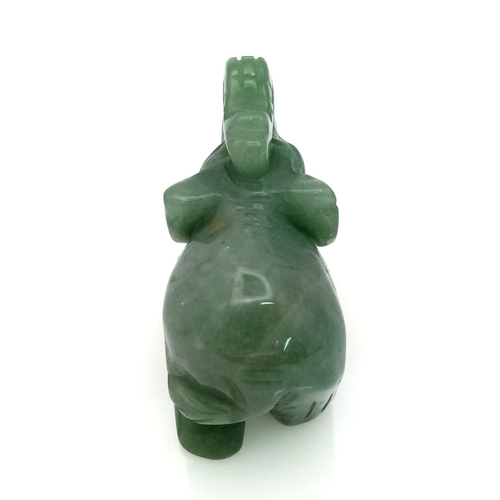 630 - A Hand-Carved Green Jade Elephant Figurine. 5cm x 4cm