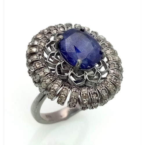 734 - A 5.40ct Blue Sapphire Ring with 1.60ct of Diamond Accents. Set in 925 Silver. Size P. Comes with a ... 