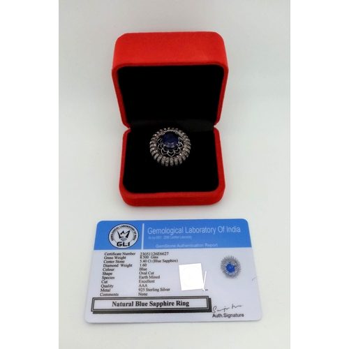 734 - A 5.40ct Blue Sapphire Ring with 1.60ct of Diamond Accents. Set in 925 Silver. Size P. Comes with a ... 