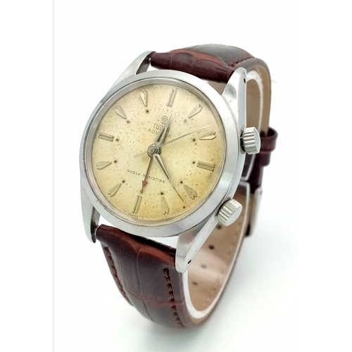 107 - A Very Rare (1950s) Tudor Advisor Alarm Gents Watch. Brown leather strap. Steel case - 34mm. Gilt di... 