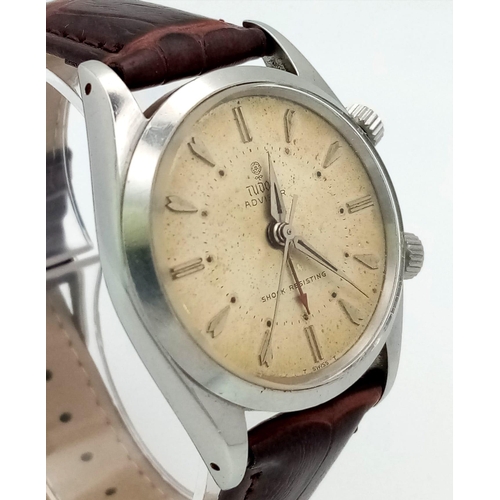 107 - A Very Rare (1950s) Tudor Advisor Alarm Gents Watch. Brown leather strap. Steel case - 34mm. Gilt di... 