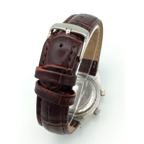 107 - A Very Rare (1950s) Tudor Advisor Alarm Gents Watch. Brown leather strap. Steel case - 34mm. Gilt di... 