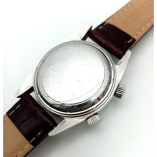 107 - A Very Rare (1950s) Tudor Advisor Alarm Gents Watch. Brown leather strap. Steel case - 34mm. Gilt di... 