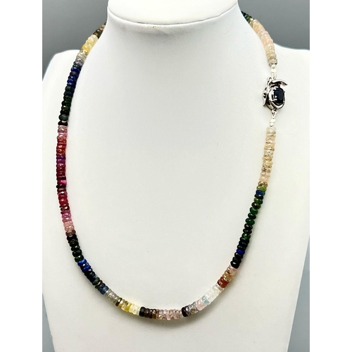 615 - A 144ct Multi-Sapphire Necklace with Sapphire clasp. Set in 925 Silver. Beads 4mm-5mm. 42cm necklace... 