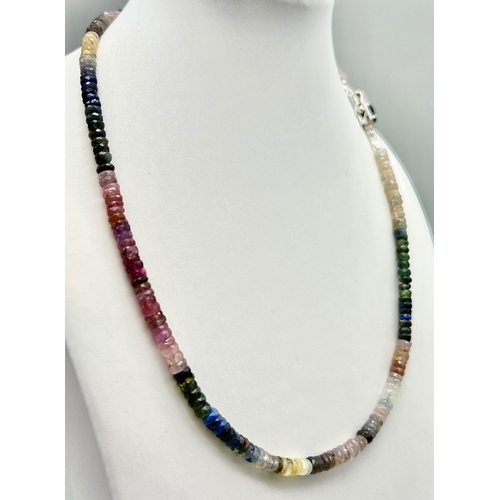 615 - A 144ct Multi-Sapphire Necklace with Sapphire clasp. Set in 925 Silver. Beads 4mm-5mm. 42cm necklace... 