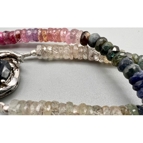 615 - A 144ct Multi-Sapphire Necklace with Sapphire clasp. Set in 925 Silver. Beads 4mm-5mm. 42cm necklace... 