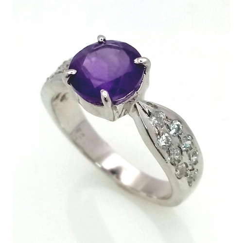 941 - An Amethyst CZ 925 Silver Ring. Size N.