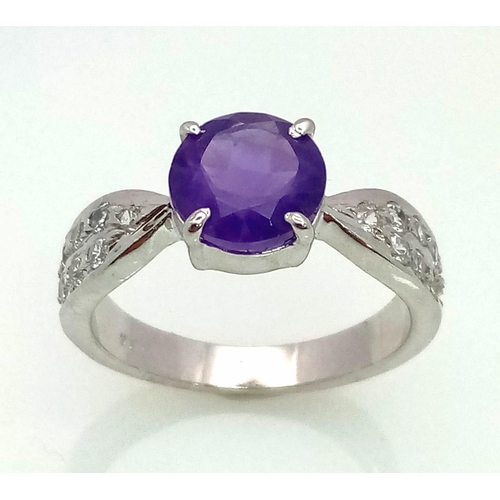 941 - An Amethyst CZ 925 Silver Ring. Size N.