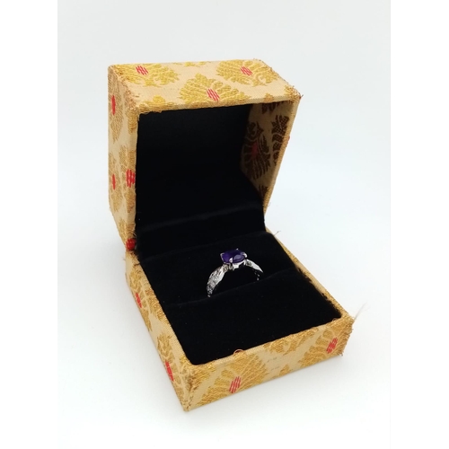 941 - An Amethyst CZ 925 Silver Ring. Size N.