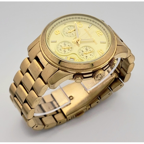 1160 - A Michael Kors Gold Plated Ladies Chronograph Watch. Gold plated bracelet and case - 38mm. Gold tone... 