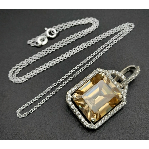 405 - A 17ct Champagne Moissanite Pendant with White stone accents on a 925 Silver Necklace. Comes with a ... 