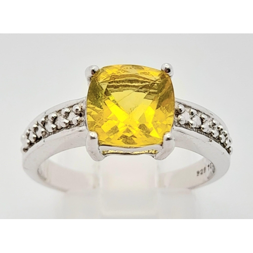 738 - A New Sterling Silver and Citrine Set Ring Size P. The Faceted Square Fancy Cut Citrine Measures 8mm... 