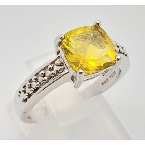 738 - A New Sterling Silver and Citrine Set Ring Size P. The Faceted Square Fancy Cut Citrine Measures 8mm... 
