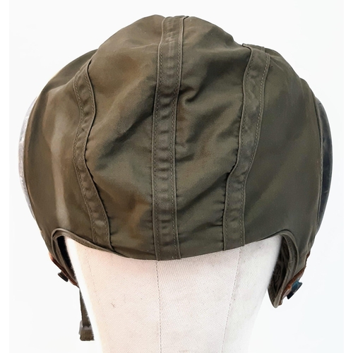 761 - Vietnam War Era Pilots Under Helmet Cap.
