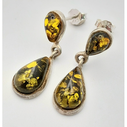 766 - A Vintage Pair of Sterling Silver Green Amber Set Pendant Earrings. Pear Cut 2.2cm Length.