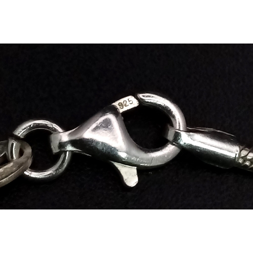 1156 - A 925 Silver Chain with 925 Silver Cross Pendant. 3cm and 48cm. 15.79g