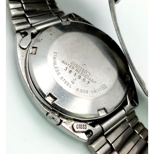 1157 - A Vintage Seiko 5 Classic TV-Shape Gents Watch. Stainless steel strap and case - 34mm. Black dial wi... 