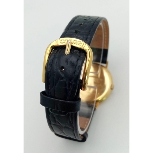 722 - A Vintage Longine 18K Gold Cased Gents Watch. Black leather strap. 18k gold case - 34mm. Silver- gre... 