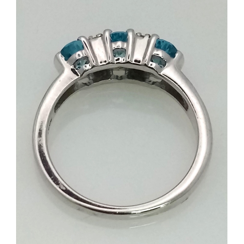 773 - New Sterling Silver Blue & White Topaz Set Ring Size P. Set with 3 Oval Cut 6mm Long Blue Topaz ... 