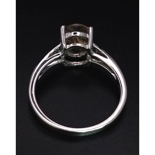 957 - A New Sterling Silver Oval Cut Citrine Ring Size R. The Citrine Measures 1cm Length and the Ring Wei... 