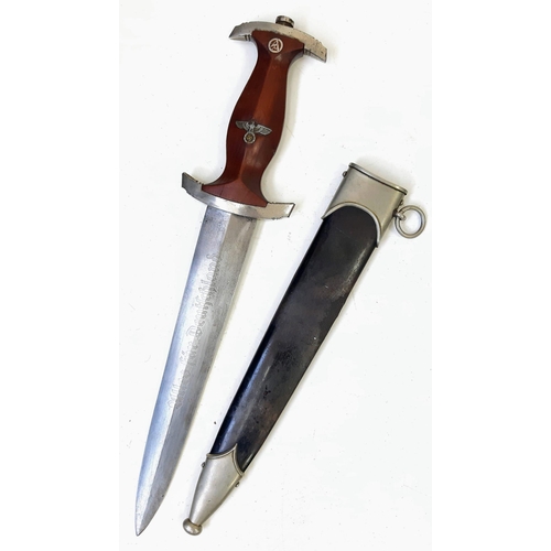 34 - 3rd Reich N.S.K.K. Dagger 1933 Pattern RZM M7/33. Maker: F.W. Holler.
This has been Authenticated as... 