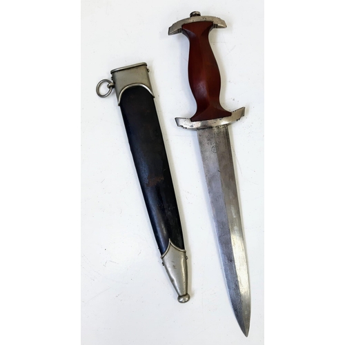 34 - 3rd Reich N.S.K.K. Dagger 1933 Pattern RZM M7/33. Maker: F.W. Holler.
This has been Authenticated as... 