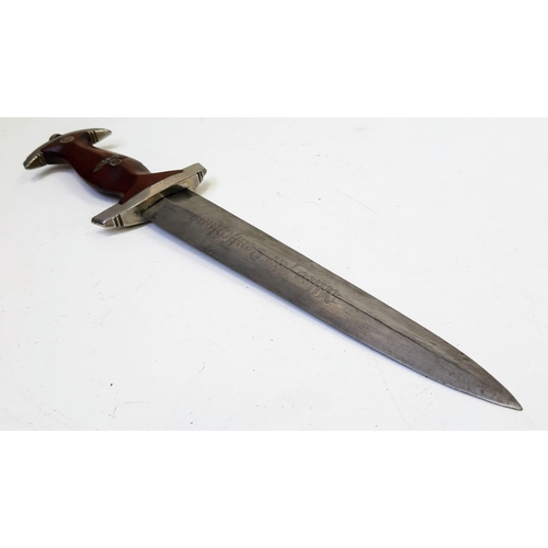 34 - 3rd Reich N.S.K.K. Dagger 1933 Pattern RZM M7/33. Maker: F.W. Holler.
This has been Authenticated as... 