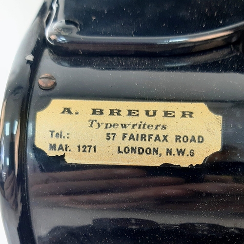 646 - A Vintage 1940s Olympia Progress Typewriter with Case. In worker order - case is slightly temperamen... 