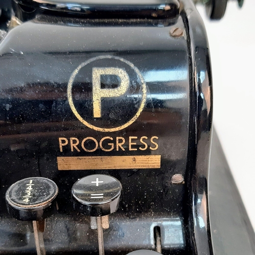 646 - A Vintage 1940s Olympia Progress Typewriter with Case. In worker order - case is slightly temperamen... 
