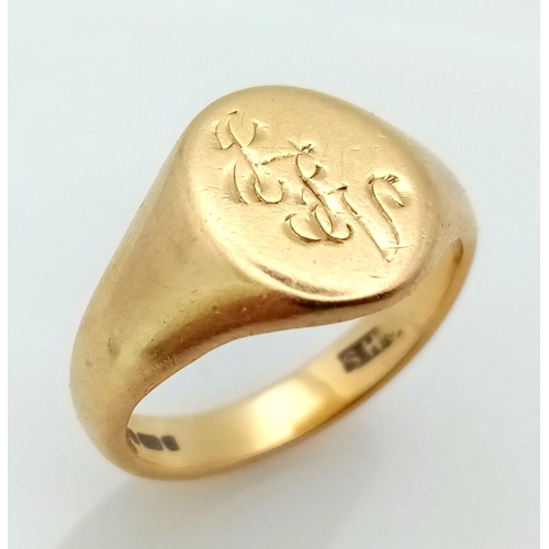 29 - 18k yellow gold engraved oval signet ring,  6.16g, size K