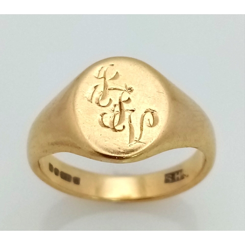 29 - 18k yellow gold engraved oval signet ring,  6.16g, size K