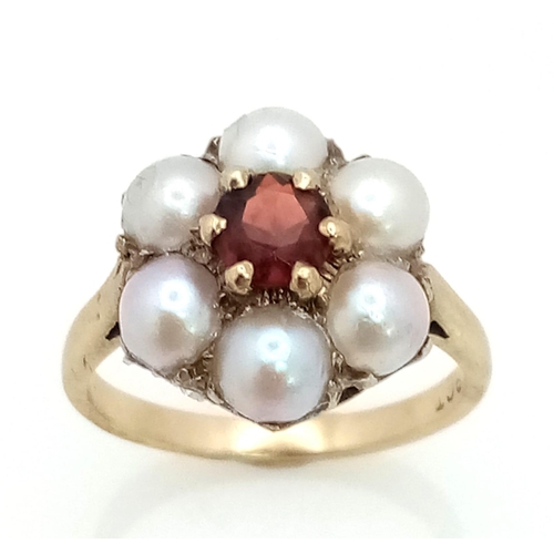 449 - 9k yellow gold pearl and garnet flower cluster ring (pearls:6x 5mm/garnets:0.60ct) 3.47g, size N