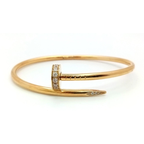 54 - 18K YELLOW GOLD CARTIER STYLE STONE SET NAIL BANGLE. TOTAL WEIGHT 10.5G