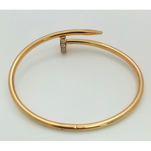 54 - 18K YELLOW GOLD CARTIER STYLE STONE SET NAIL BANGLE. TOTAL WEIGHT 10.5G