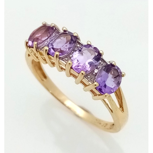 631 - 9K YELLOW GOLD DIAMOND & AMETHYST RING. TOTAL WEIGHT 2.2G. SIZE P