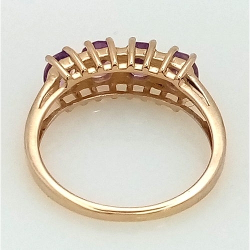 631 - 9K YELLOW GOLD DIAMOND & AMETHYST RING. TOTAL WEIGHT 2.2G. SIZE P