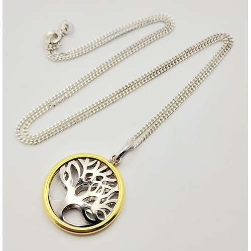647 - An Unworn Gold On Silver Tree of Life Pendant Necklace. Pendant Measures 2cm Diameter on 46cm Sterli... 